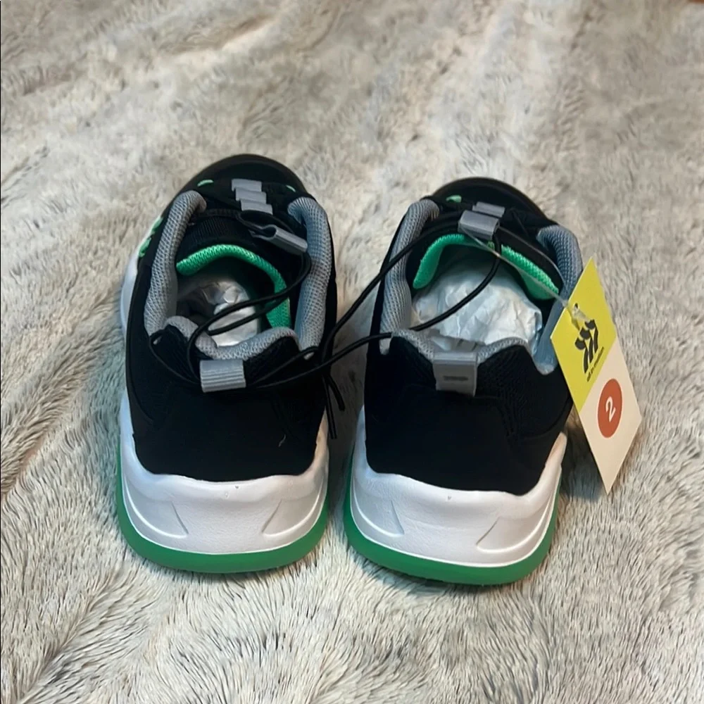 All in Motion Black and Green Sneakers for Active Lifestyle
